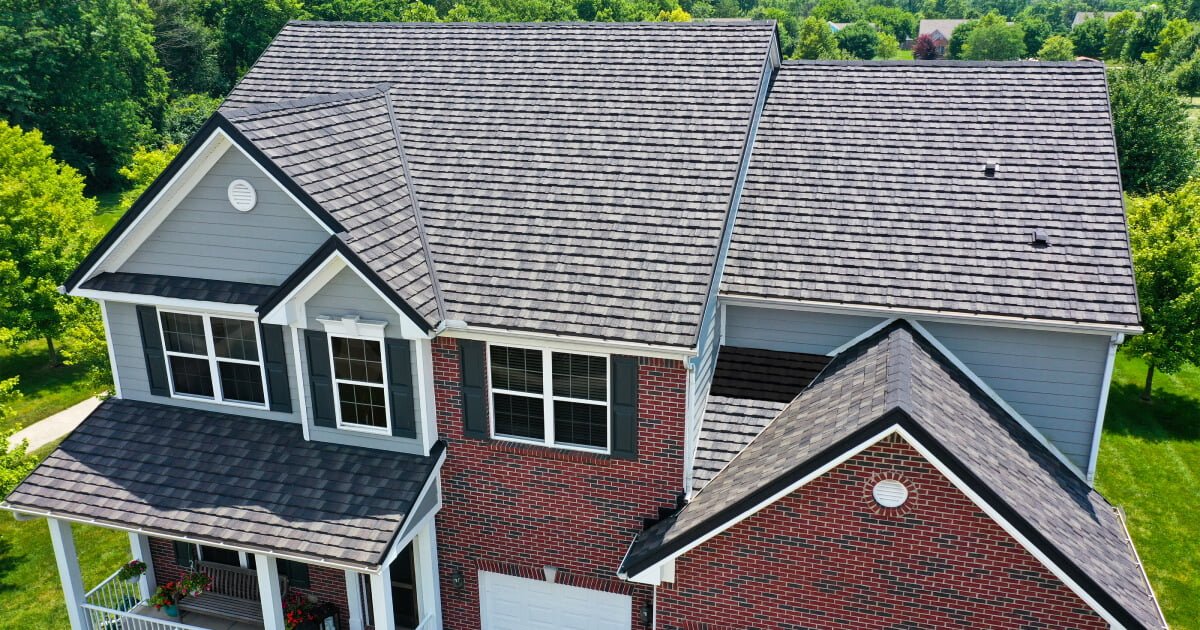 Finished standing-seam metal roof on a house. Project photograph from the offer brand’s image set.